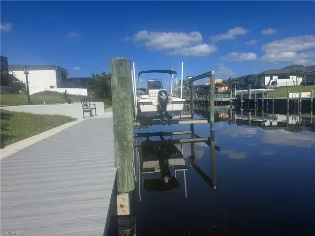 Dock area featuring boat lift