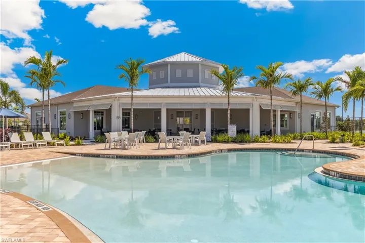 Community pool featuring a patio area