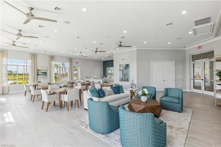 Living room featuring ceiling fan, crown molding, recessed lighting, light wood-style flooring, and french doors
