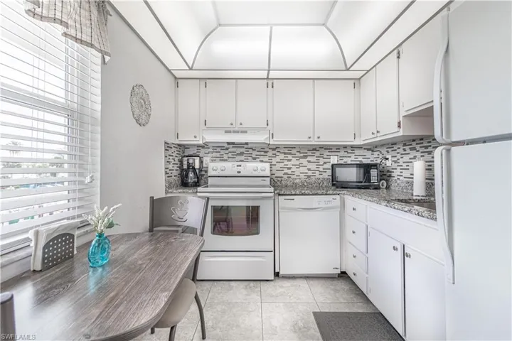 Kitchen with white appliances