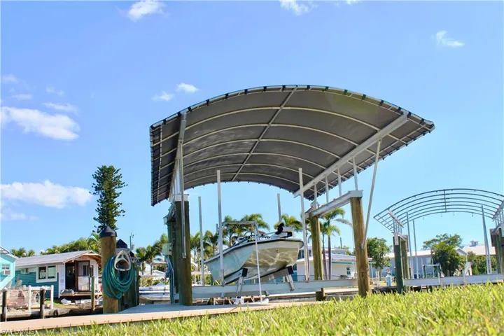 Boat Dock and Canopied Lift right in the backyard