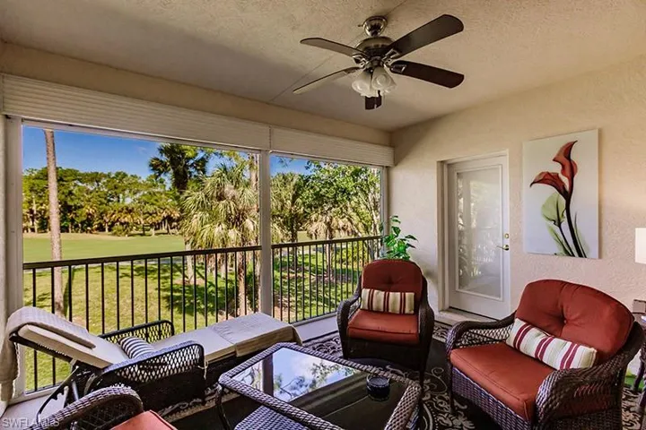 Sunroom featuring ceiling fan