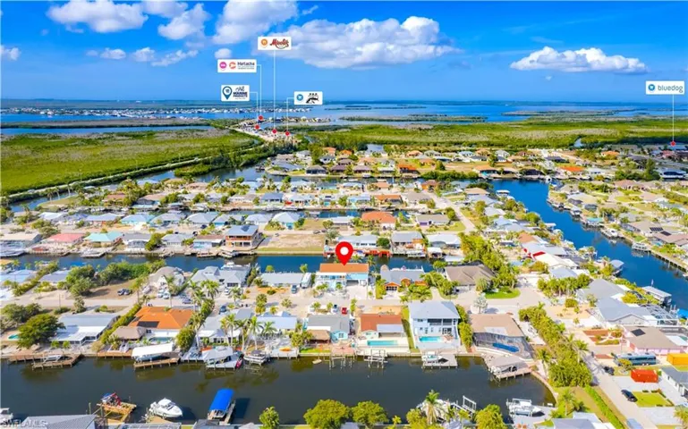 Aerial view of residential area with a large body of water