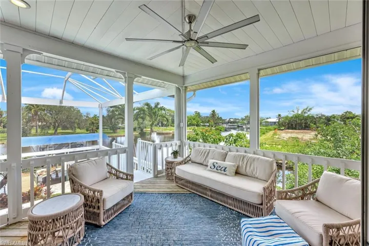 Riverside covered lanai on the upper level, just outside of the great room. Sunset anyone?