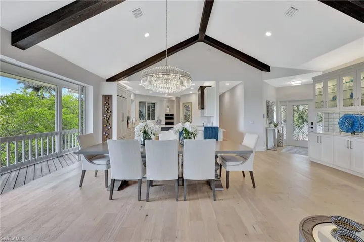 View of dining area looking into kitchen.