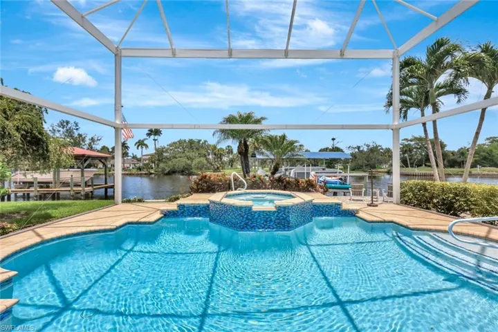 Your oasis along the Imperial River - newly resurfaced and tiled pool.