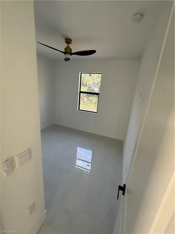 Unfurnished room with ceiling fan