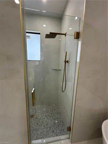 Bathroom featuring an enclosed shower