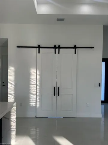 Entrance foyer featuring a barn door