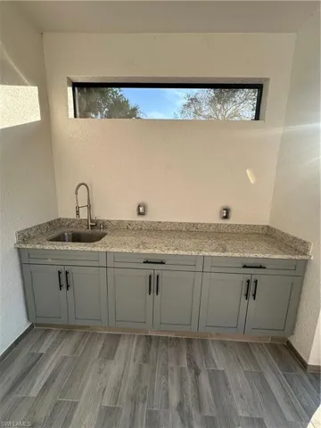 Bathroom with plenty of natural light and sink