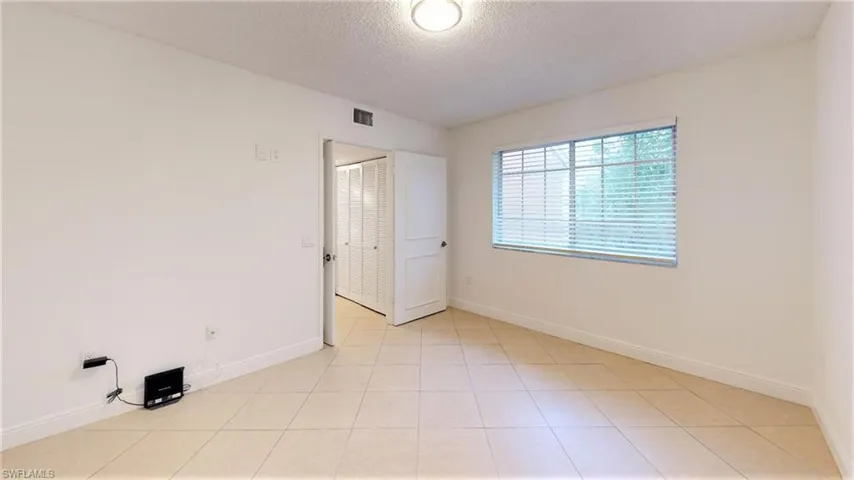 1210  Wildwood Lakes  BLVD, Naples, FL 34104
