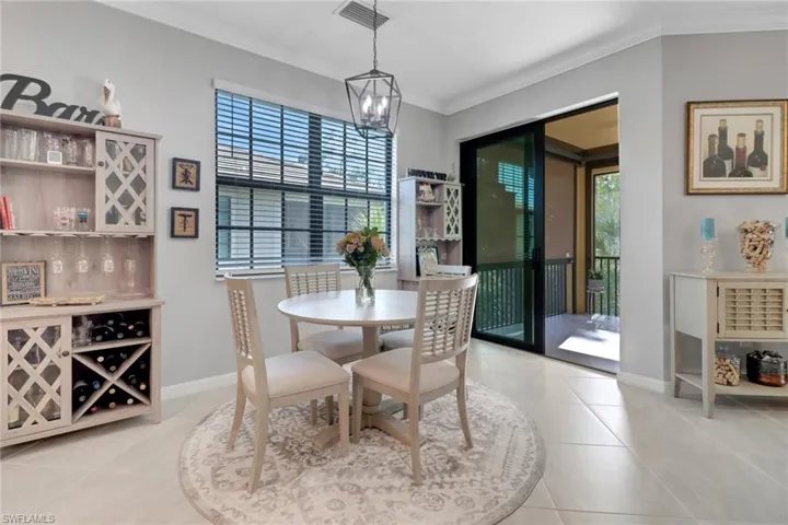 Casual dining area open to the lanai