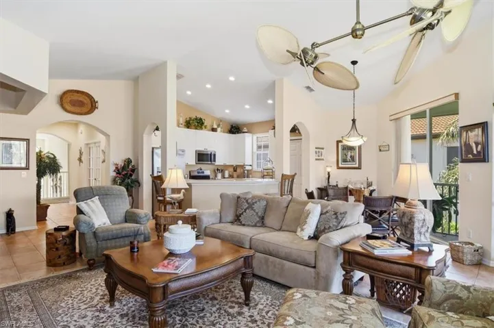 Living room with paddle fans.