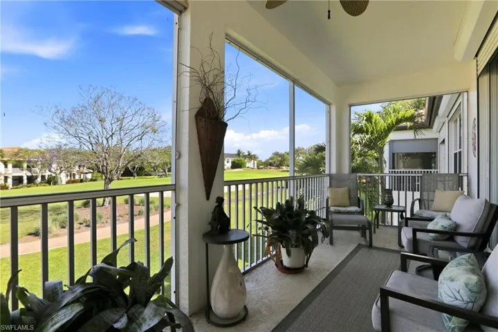 Panoramic view of golf course and lake.