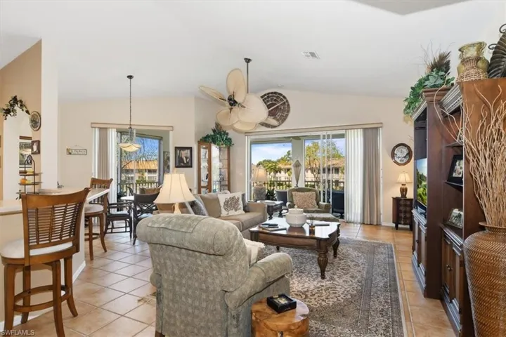 Breakfast bar, and living room, opens onto spacious lanai.