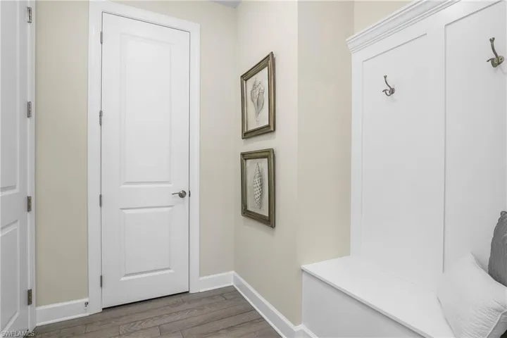 This Drop-Zone is GREAT for extra storage and includes storage bench with hooks, and additional storage closet!