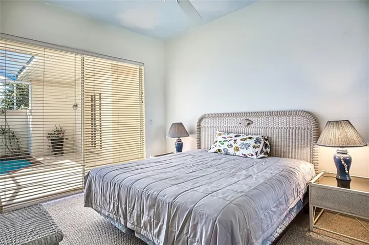 Bedroom featuring carpet flooring and ceiling fan