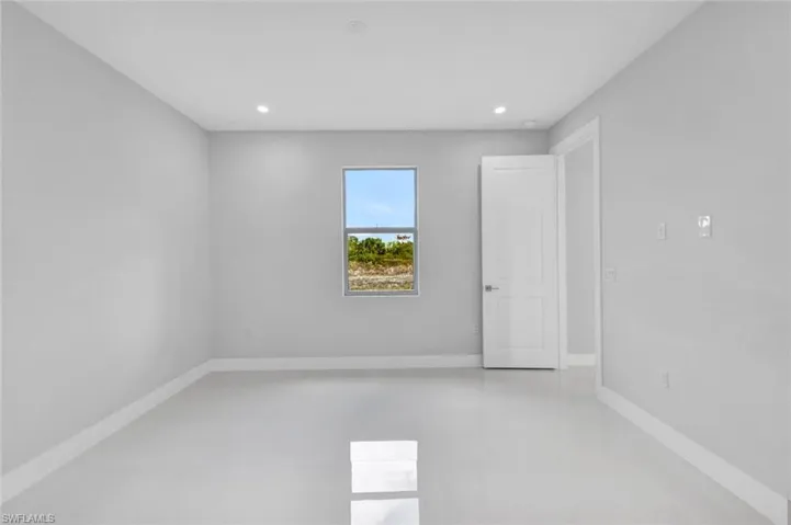 Unfurnished room featuring recessed lighting