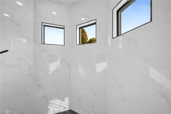 Bathroom with a tile shower