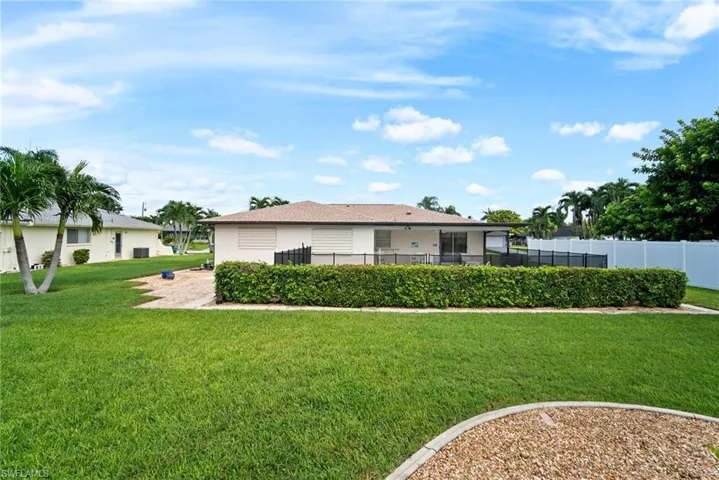 View of front of house with a front lawn
