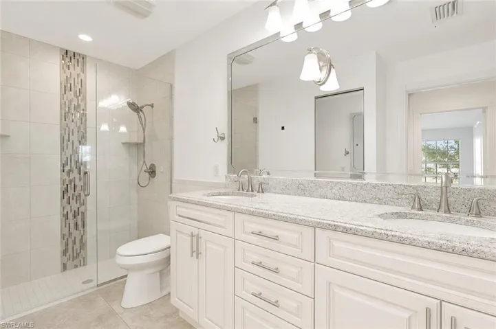 Master bathroom staged photo cabinets painted.