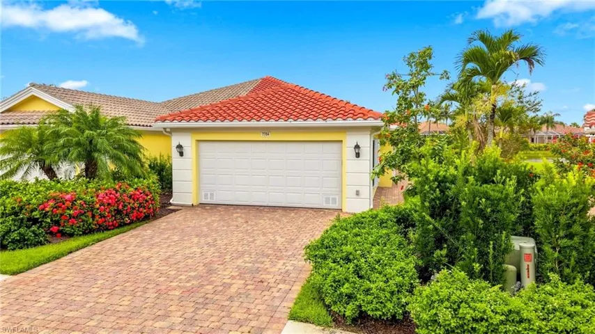 Front of the Property with paved driveway and newer Roof (2021)