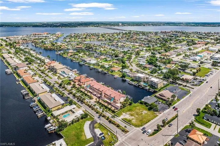 Aerial view of residential area with a large body of water