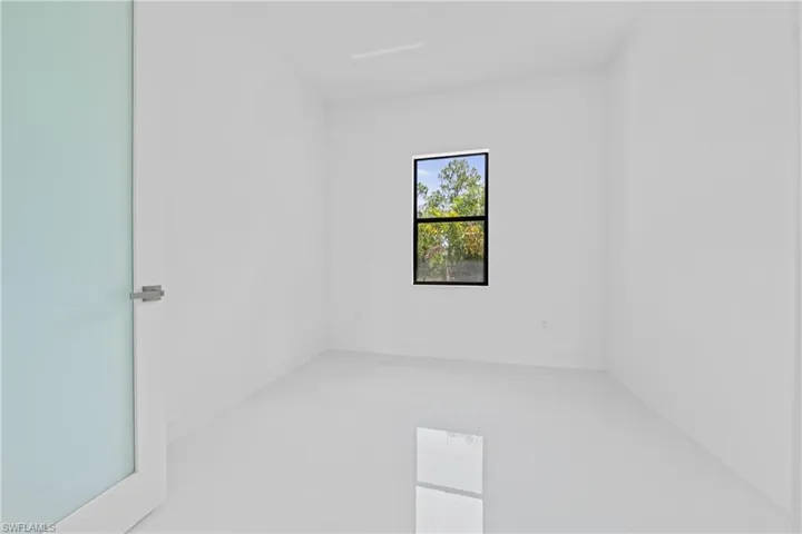 Empty room with baseboards