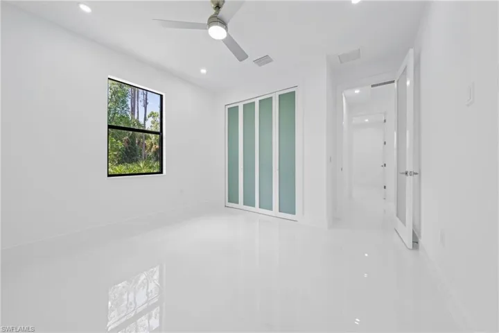 Unfurnished room with recessed lighting and ceiling fan