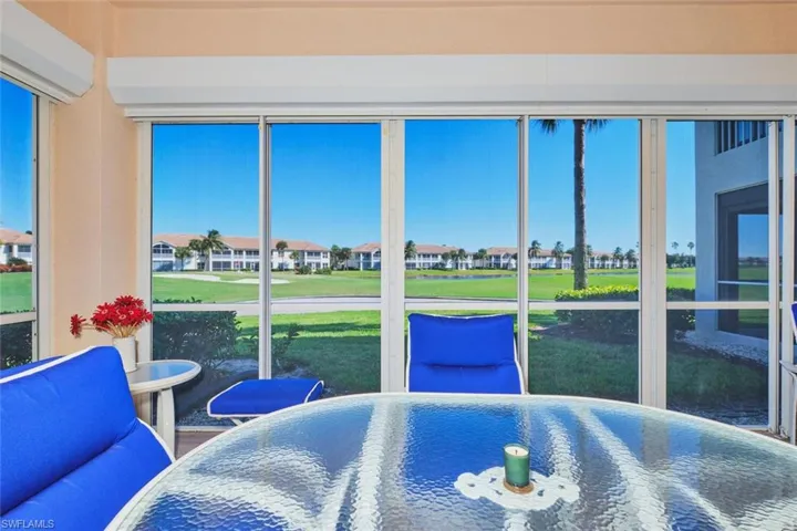 Sunroom / solarium with golf course view