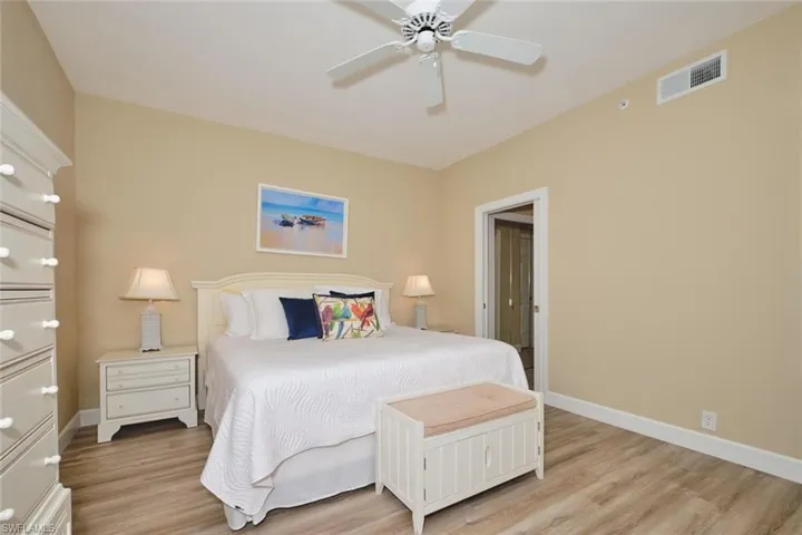 Bedroom featuring light wood finished floors and a ceiling fan
