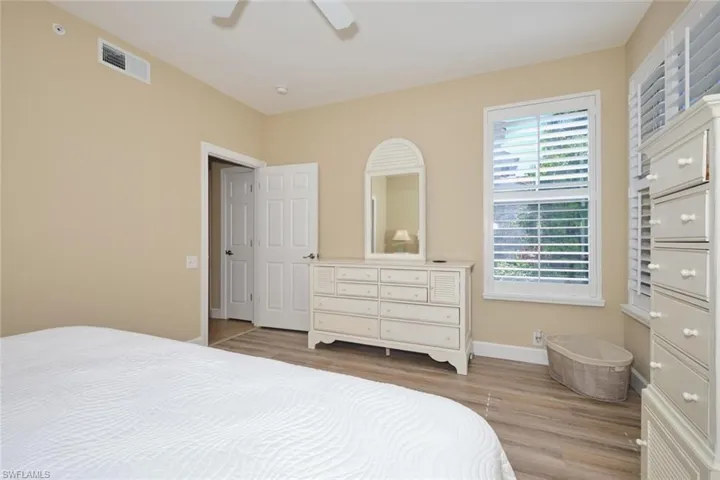 Bedroom featuring light wood-style flooring and ceiling fan