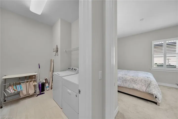 Laundry room with view into InLaw suite
