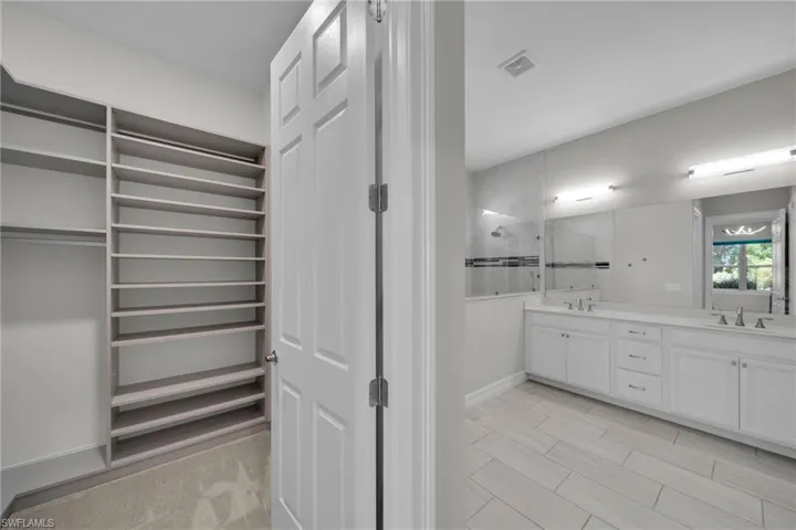 Master Walk in Closets with Built-Ins