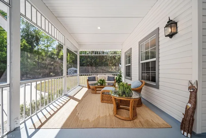 Sunroom featuring plenty of natural light