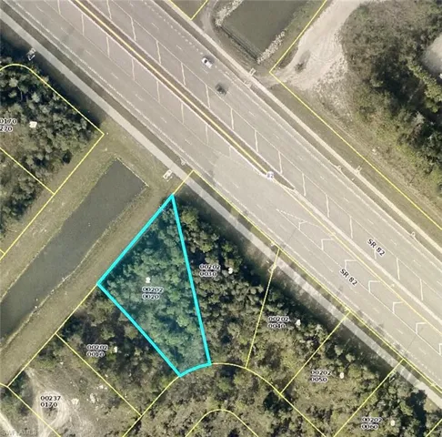 Aerial view of property's location featuring property parcel outlined