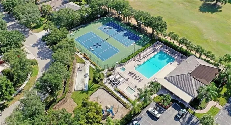 Community pool, community building with workout facility, tennis courts and playgorund - view of Arrowhead Golf Course