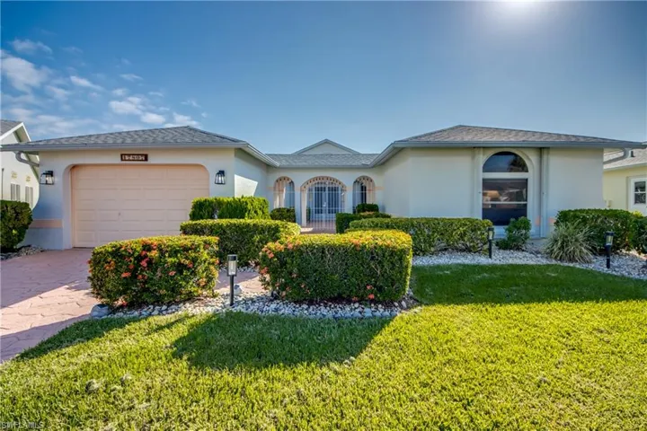 2 bedroom + Den Courtyard Home on a gorgeous waterfront lot.  Roof 2020.  All new exterior lighting.
