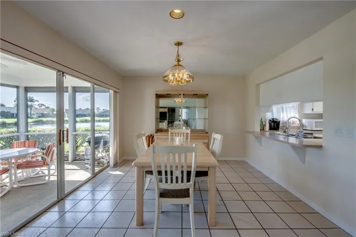 Large Dining room with convenient pass thru from kitchen.