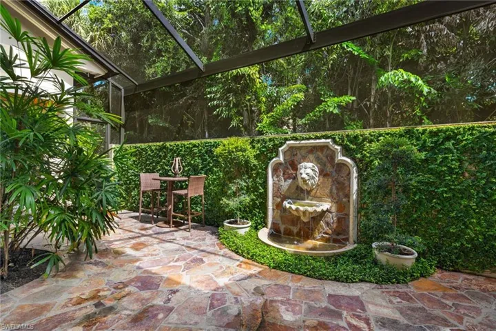 View of patio / terrace with a lanai