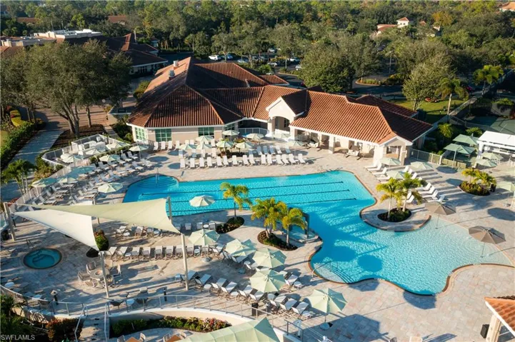 Community pool with a patio area