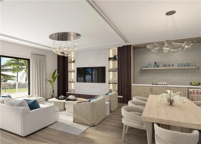 Living area with a chandelier and wood finished floors