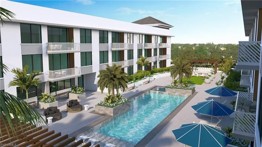 Community pool with a patio area and a pergola