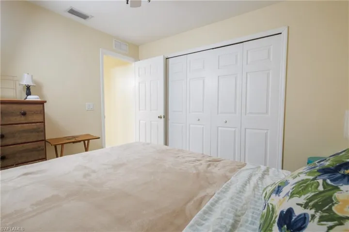 Bedroom with a closet and ceiling fan