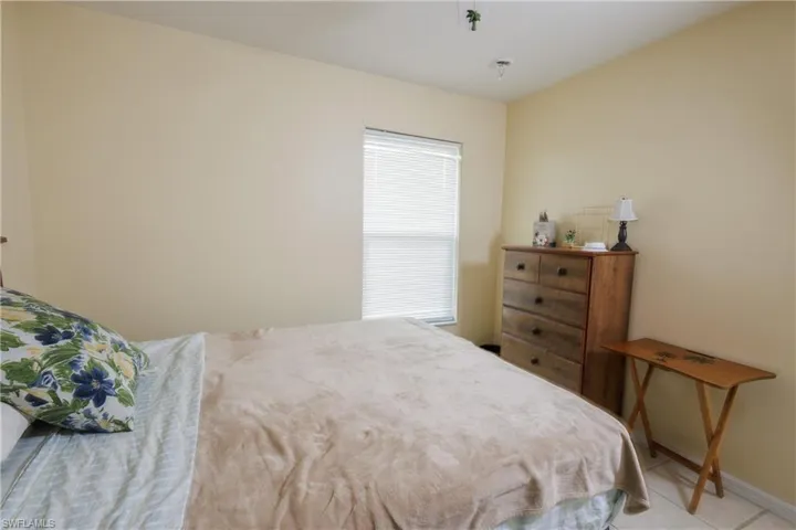 Bedroom featuring baseboards
