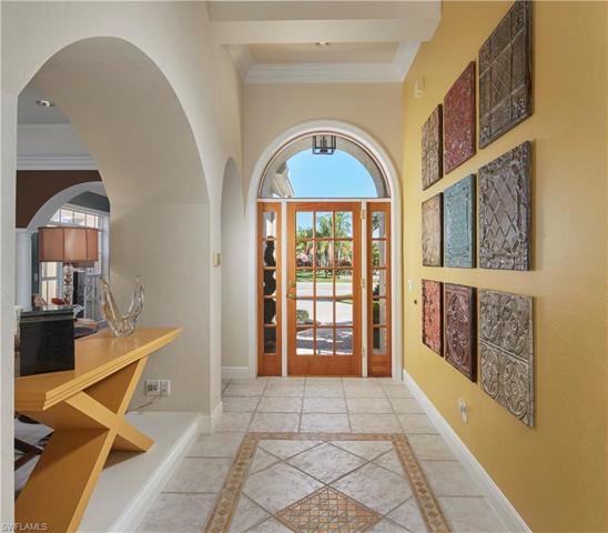 Entry hallway with arched window.