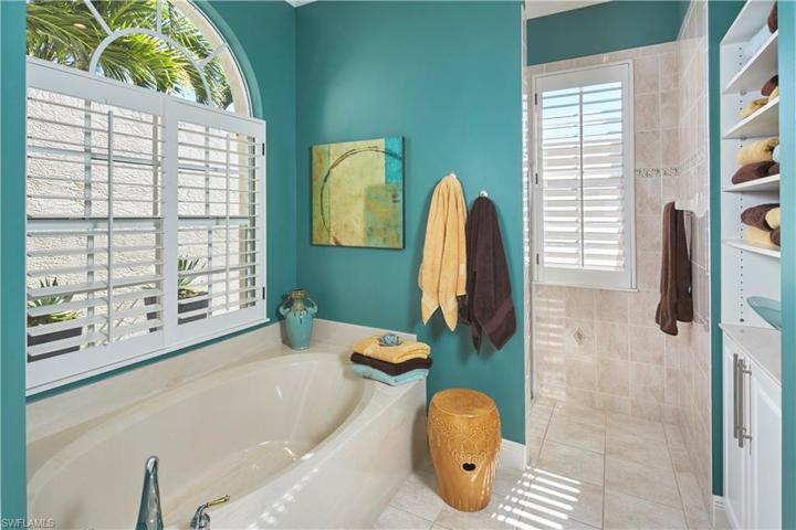 Primary bathroom feels like a luxurious spa.