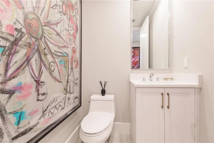 Bathroom with vanity and toilet