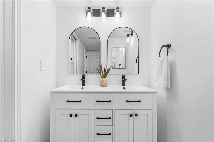 Bathroom with a sink and double vanity