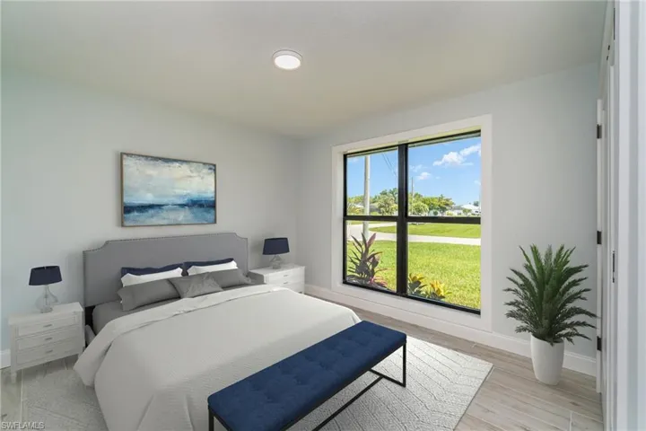 Bedroom with tile plank floors